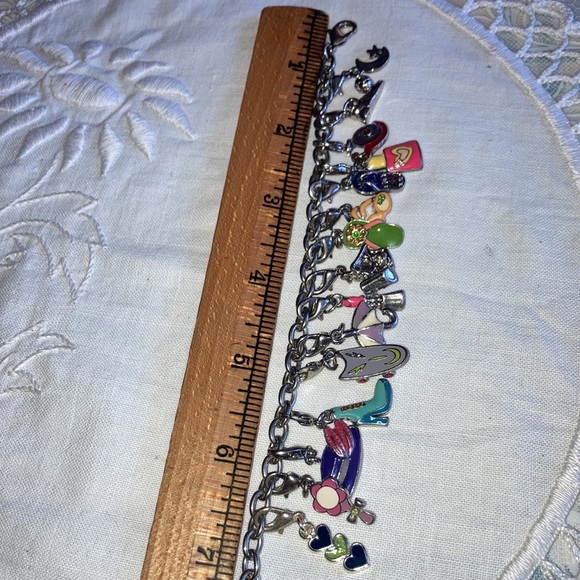 VTG st charm bracelet loaded w/cute bright enameled colors, 8” chain. $45 - Picture 2 of 7